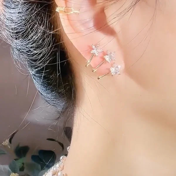 One ear hole with three effect flower earrings