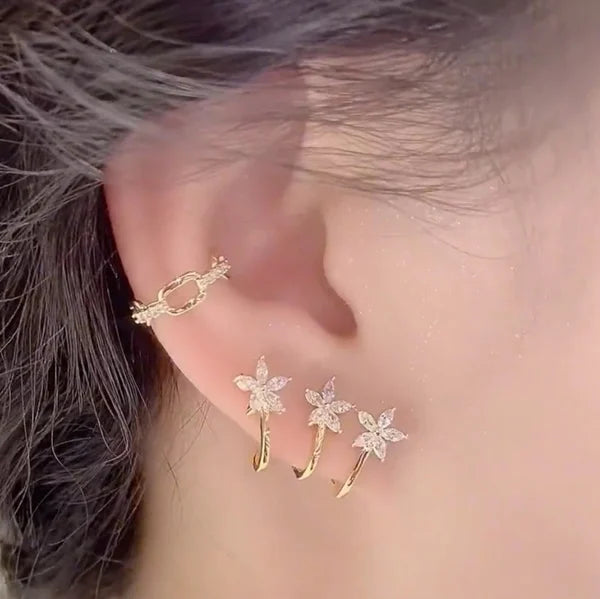 One ear hole with three effect flower earrings